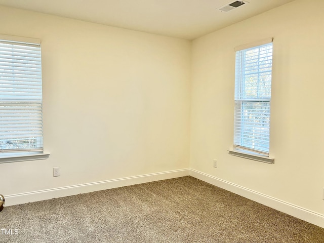 view of carpeted spare room