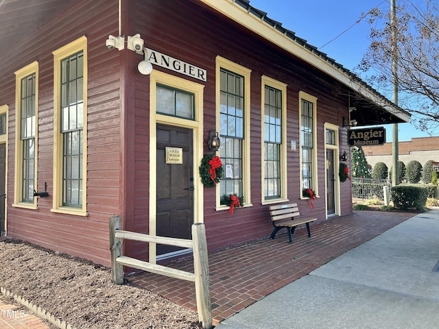 doorway to property featuring a porch