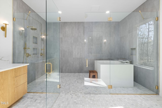 bathroom with vanity and an enclosed shower