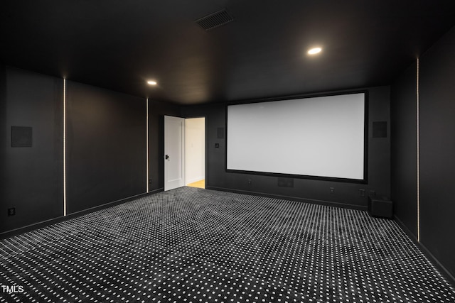 home theater with dark carpet