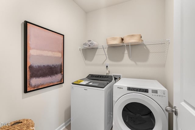 laundry room featuring separate washer and dryer