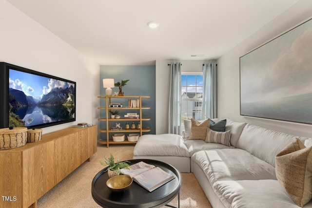 living room featuring light colored carpet