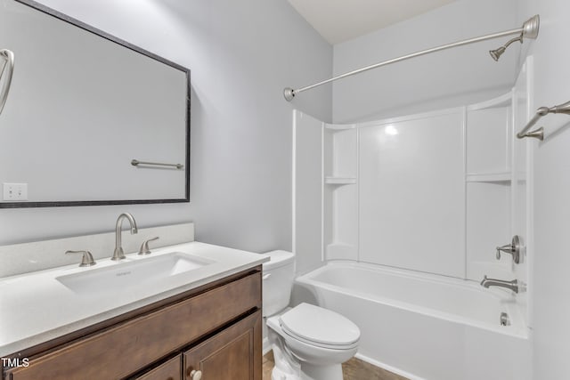 full bathroom featuring vanity,  shower combination, and toilet