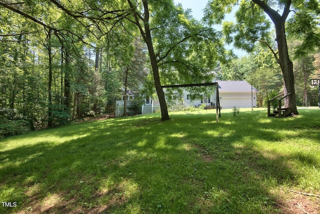 view of yard featuring a garage