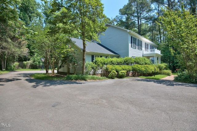 view of home's exterior featuring aphalt driveway