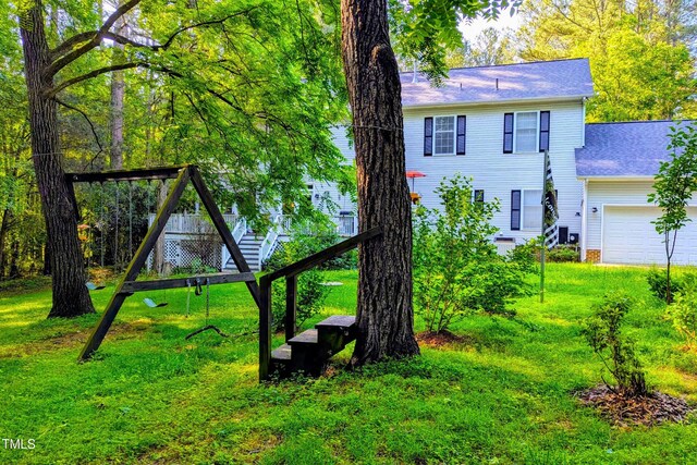 340 Andrews Store Rd, Pittsboro, NC 27312 - view of green lawn with a garage