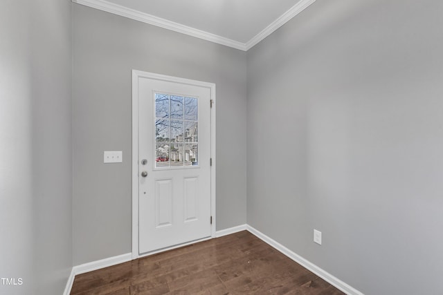 entryway with dark hardwood / wood-style flooring and ornamental molding