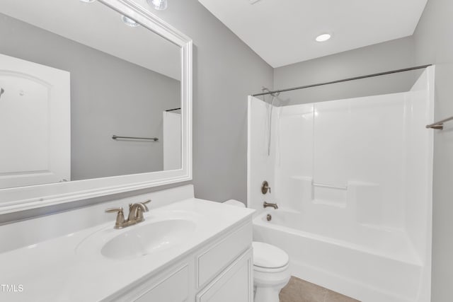 full bathroom with tile patterned flooring, toilet, vanity, and tub / shower combination