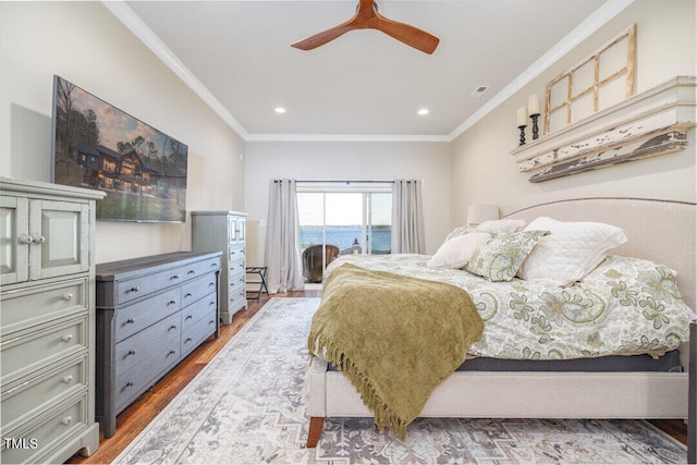 bedroom featuring access to exterior, ceiling fan, crown molding, and hardwood / wood-style flooring