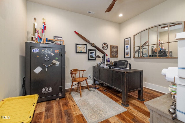 office space featuring ceiling fan and dark wood-type flooring