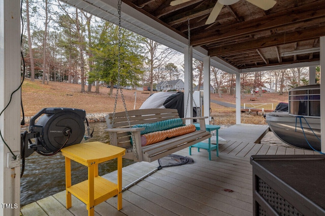 wooden terrace with ceiling fan