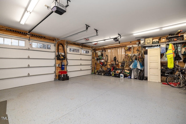 garage featuring a garage door opener