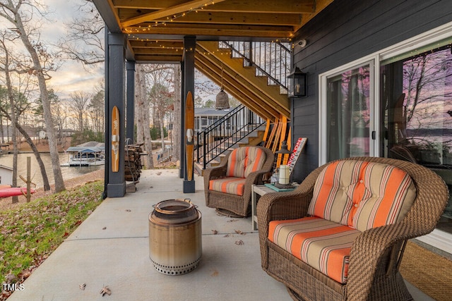 patio terrace at dusk with outdoor lounge area