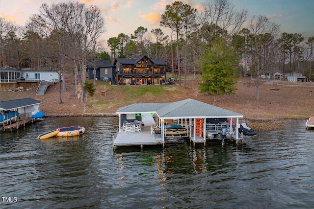 dock area with a water view