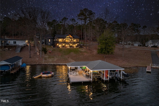 dock area featuring a water view