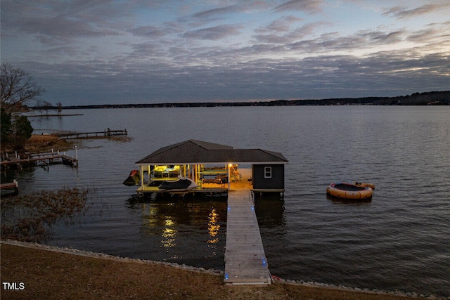 view of dock with a water view