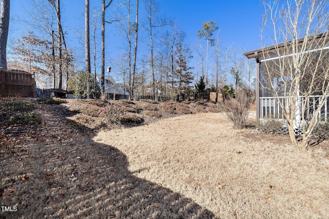 view of yard featuring a sunroom