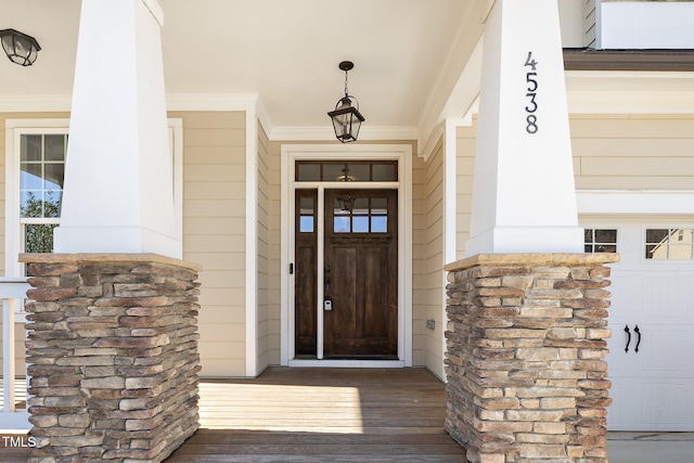 doorway to property featuring a garage