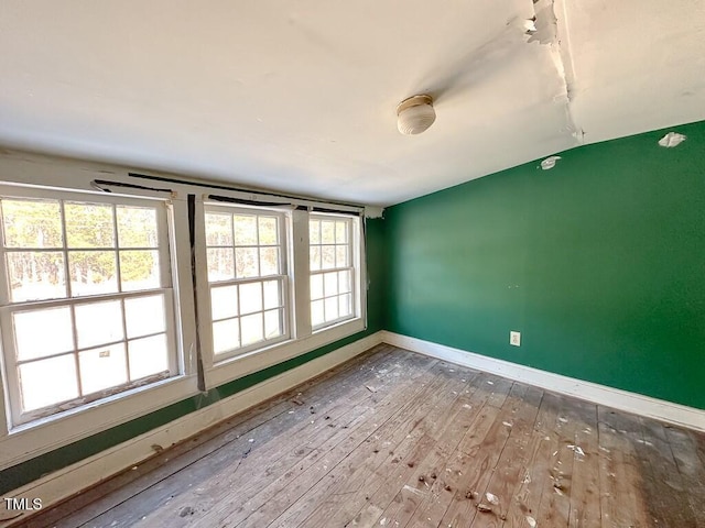 empty room featuring hardwood / wood-style floors