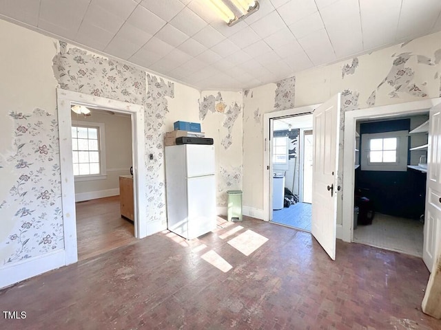 spare room featuring dark hardwood / wood-style floors