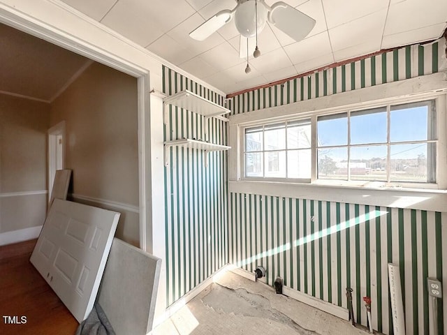 interior space featuring ceiling fan