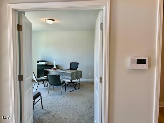 office area with light colored carpet