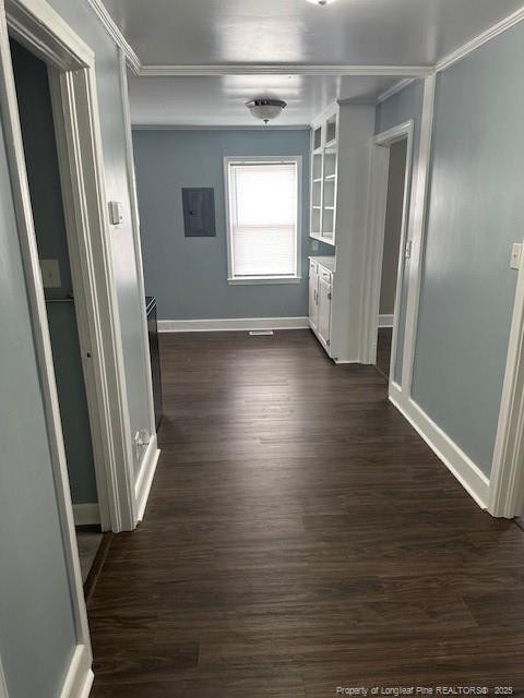 1016 E 8th St, Lumberton, NC 28358 - hallway with crown molding and dark hardwood / wood-style flooring