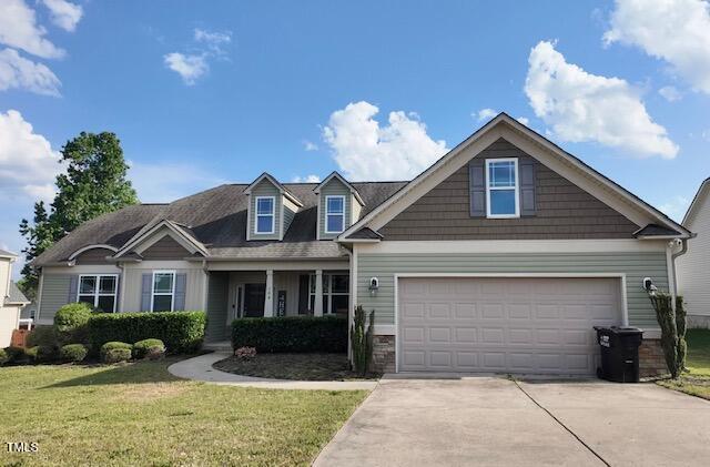 108 Kaspurr Dr, Garner, NC 27529 - craftsman-style home with driveway and a front yard