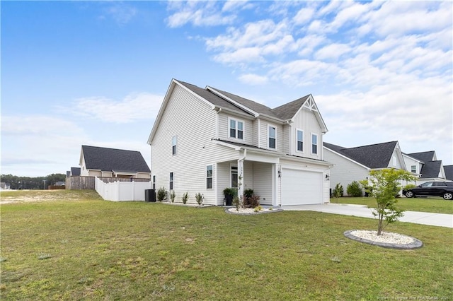 traditional home with a garage, central AC, fence, driveway, and a front lawn