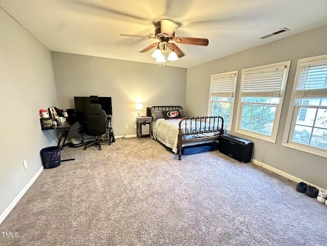 bedroom featuring ceiling fan and carpet flooring