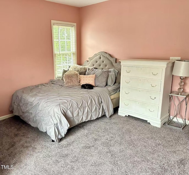 bedroom featuring carpet