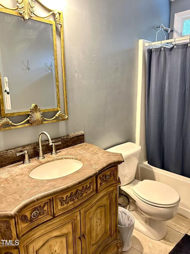 full bathroom featuring vanity, shower / bathtub combination with curtain, and toilet