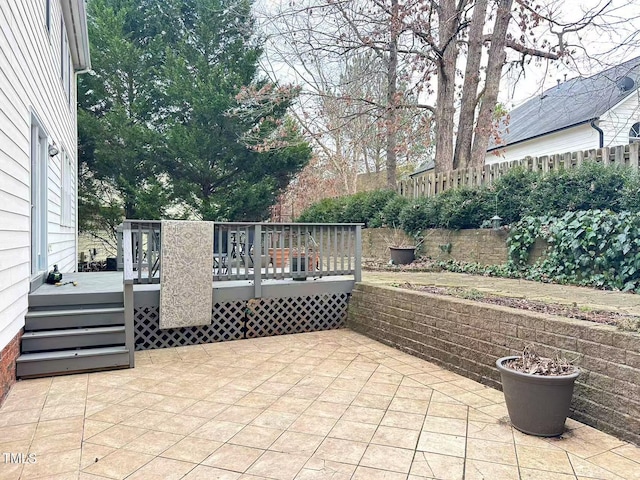 view of patio featuring a wooden deck