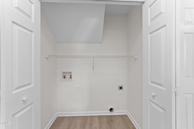 laundry room featuring laundry area, baseboards, wood finished floors, hookup for a washing machine, and hookup for an electric dryer