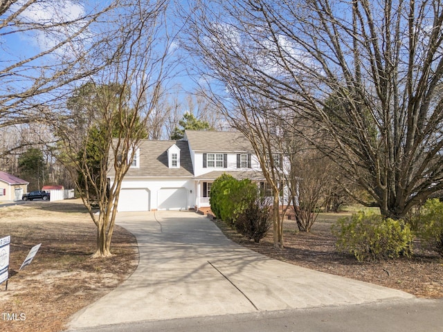 view of front of home featuring a garage and driveway