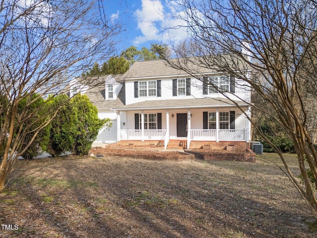 view of front of house with a porch, an attached garage, central AC, a shingled roof, and crawl space