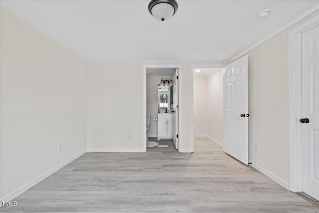 unfurnished room featuring light wood-type flooring