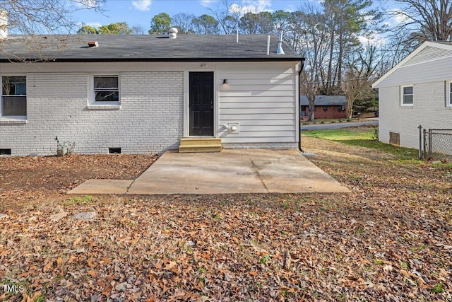 rear view of house featuring a patio