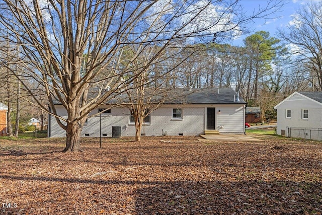 rear view of property featuring a patio area