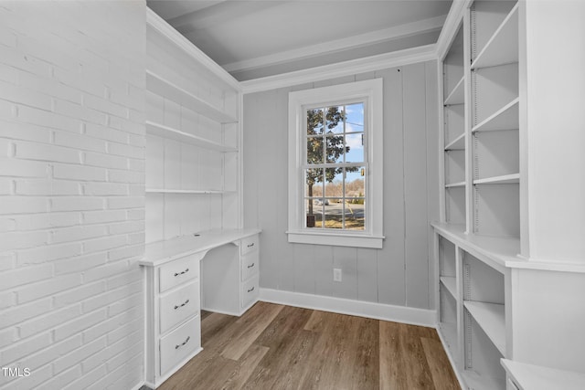 unfurnished office with dark wood-type flooring