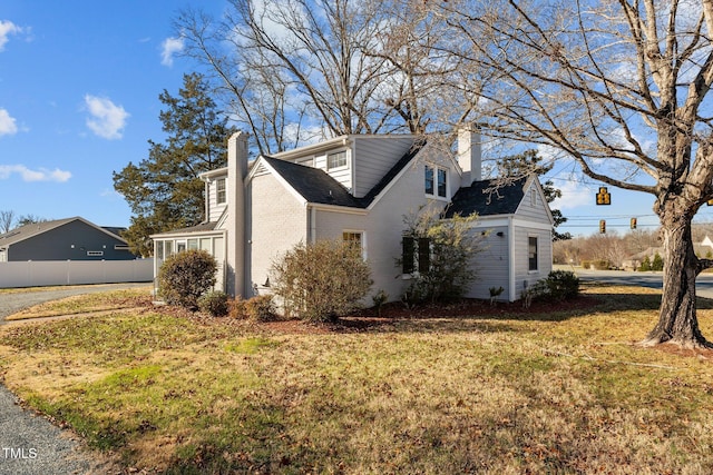 view of property exterior featuring a yard