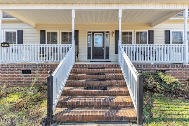 property entrance with a porch