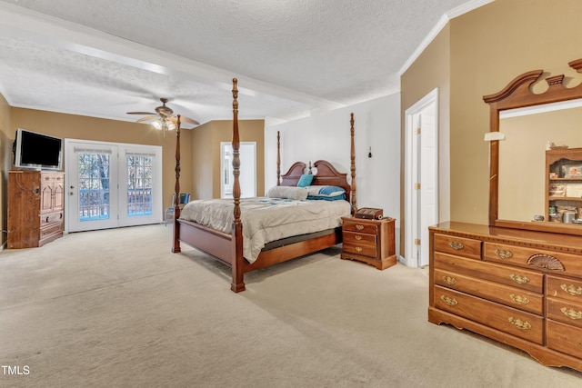 bedroom featuring ceiling fan, access to exterior, light colored carpet, and a textured ceiling