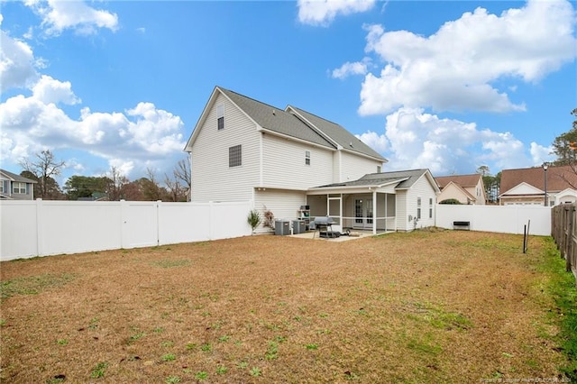 back of house featuring cooling unit and a patio