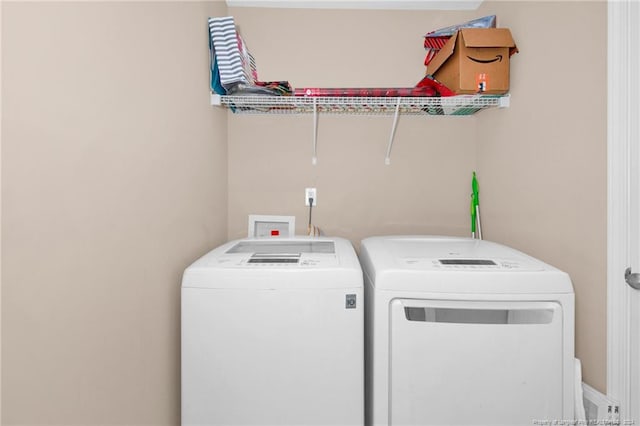 washroom featuring separate washer and dryer