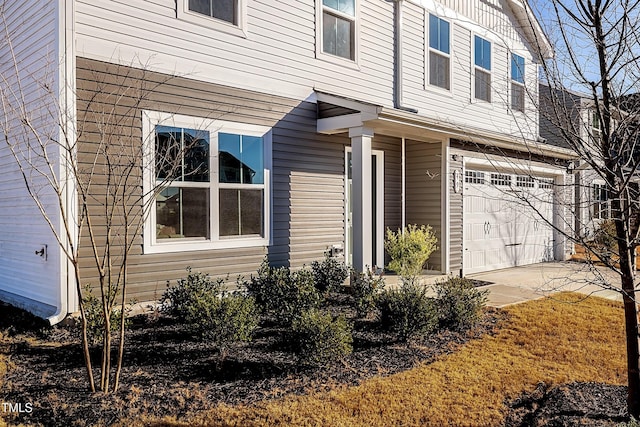 exterior space with a garage