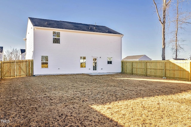 rear view of property with a patio