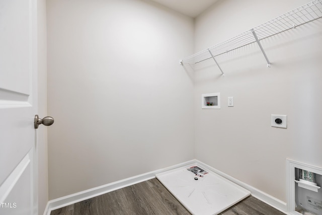 washroom with hardwood / wood-style floors, washer hookup, and hookup for an electric dryer