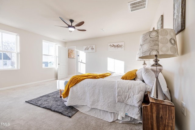 bedroom featuring ceiling fan and carpet floors