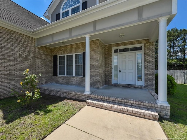 property entrance featuring a porch